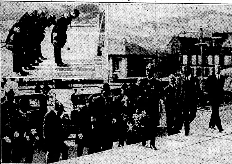 Evening Post" Photo. NIPPON PAYS HOMAGE TO NEW ZEALAND'S WAR EEROZS.-Rear-Admiral Kamesaburo NaKa^ mura, commander of the Japanese training squadron at present visiting Wellington, about to ■ lay a wreath today at .the National War Memorial Carillon in'memory, oj New Zealanders who fell in the Great War. Inset, Japanese naval officers bowing their heads in respect to New Zealand's fallen soldiers. (Evening Post, 17 May 1935)