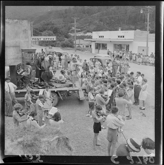 Children's orchestra playing outside Post Office, Wainuiomata, Lower Hutt