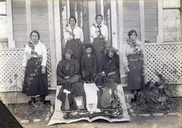 Image: Group on a verandah : Photograph