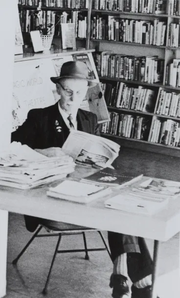 Image: Perusing the paper, Papatoetoe Library, 1962