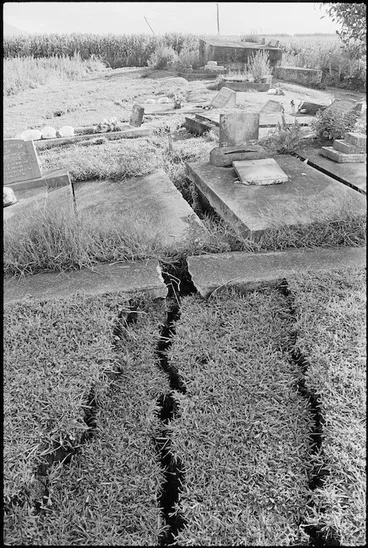 Image: Damage caused by the Edgecumbe earthquake at Kokohinau Marae cemetery, Te Teko - Photograph taken by John Nicholson