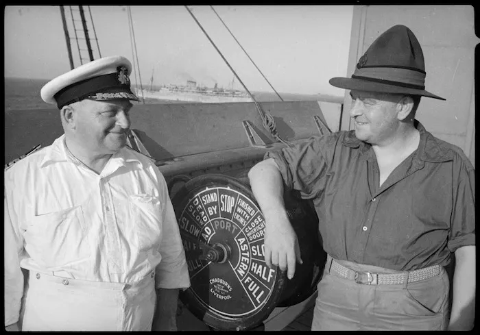 Chaplain Major J Hiddlestone with the captain of his transport