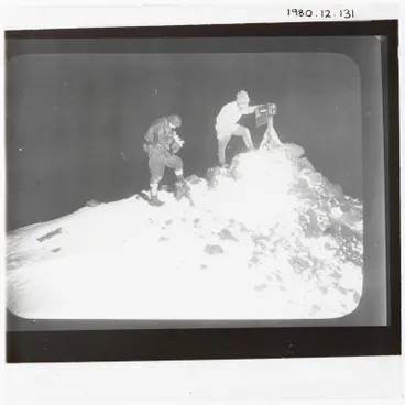 Image: Lantern Slide: Two men reading a thermometer