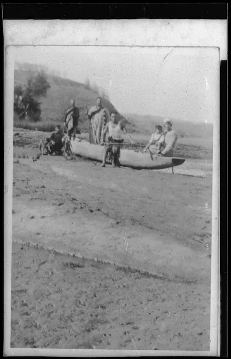 Fishing waka being launched on Papatapu Creek, Aotea Harbour, north of Kawhia