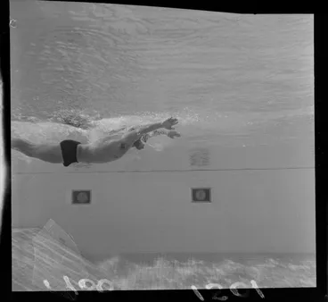 Image: Peter Hatch, demonstrates swimming techniques at Naenae baths, Naenae, Lower Hutt, Wellington