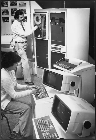 Image: Carol Canvin and Paul Anderson, of Data General New Zealand Ltd, operating computers at the Am-Tech business machines exhibition in Wellington - Photograph taken by Ian Mackley
