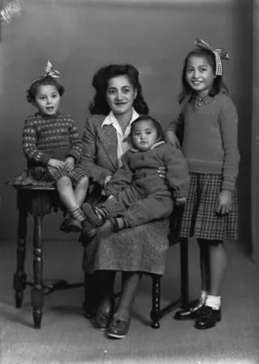 Image: [Unidentified group portrait of a mother with three children, taken at Belwood Studios, Auckland.]
