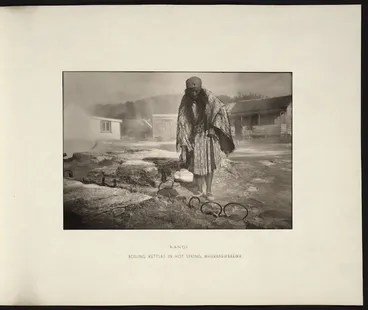Image: Guide Rangi boiling kettles in hot spring, Whakarewarewa