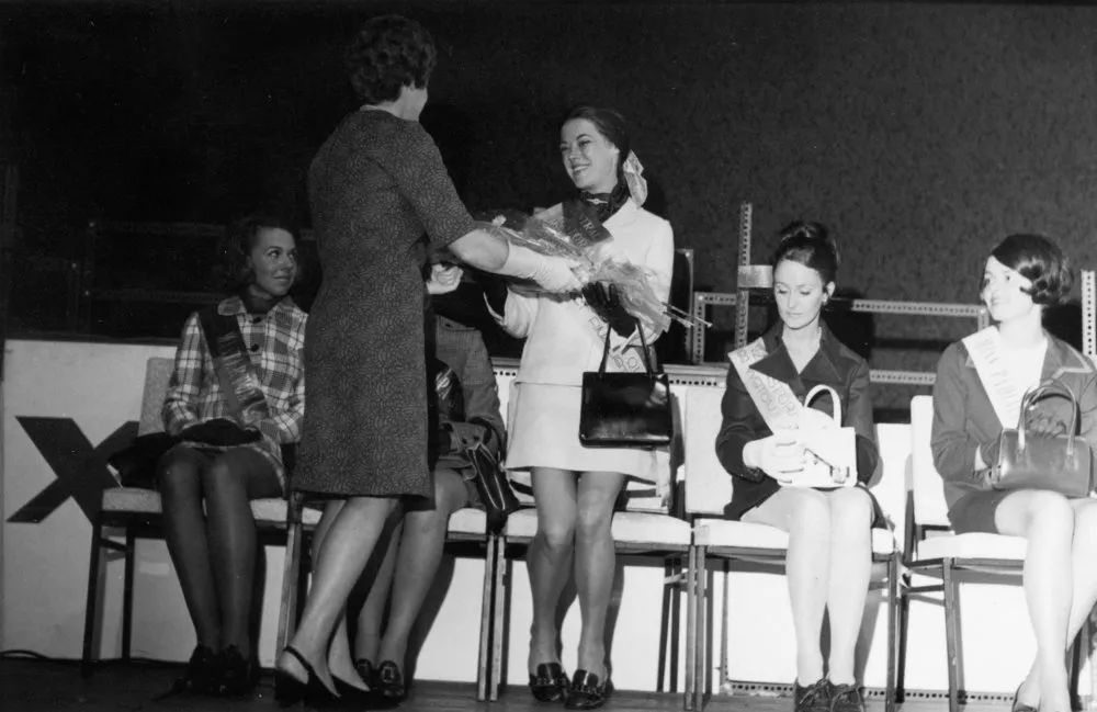 Eastern District Pastoral Queen receiving bouquet.