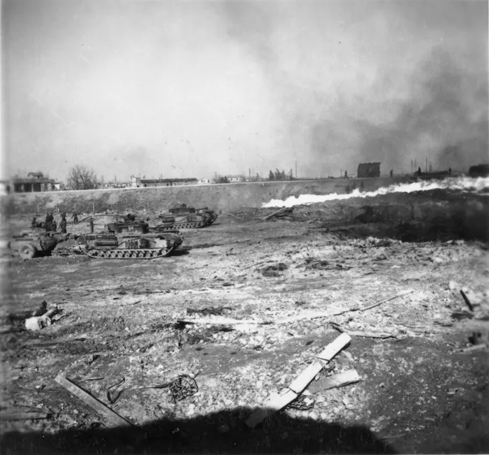 Gourdie, A M, fl 1945 (Photographer) : Flamethrowers practising for the crossing of the Senio River, Italy