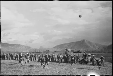 Image: Spectators watching play in rugby match in the Cassino area, Italy, World War II - Photograph taken by George Kaye