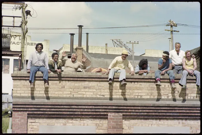 Group of men watch Hīkoi