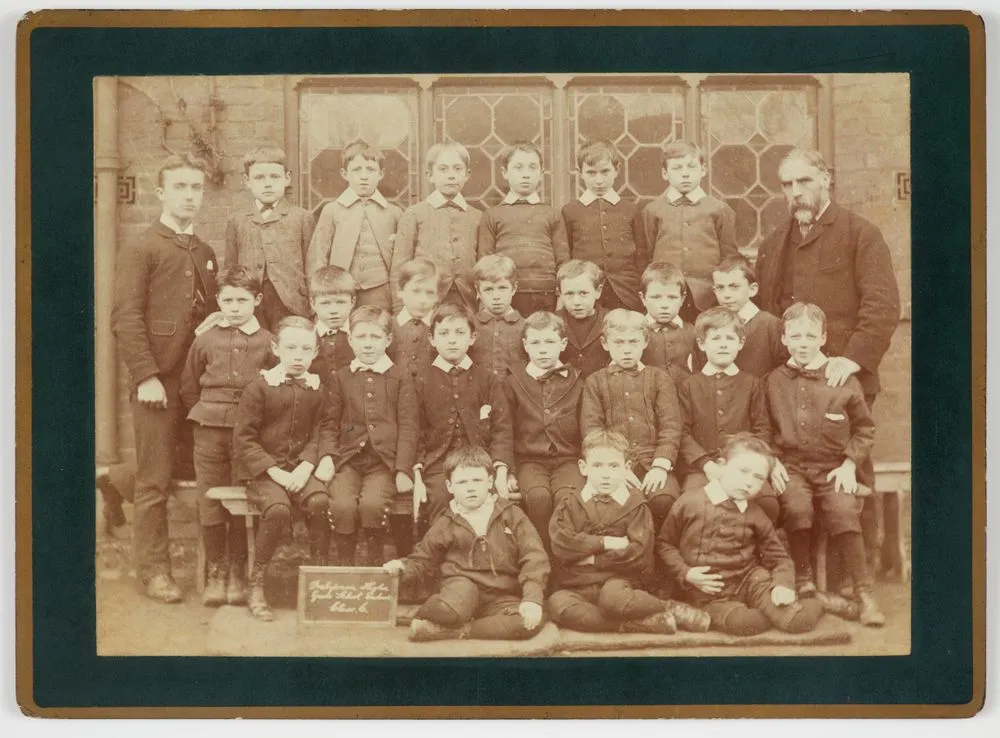 [School portrait of a class of boys & teachers]