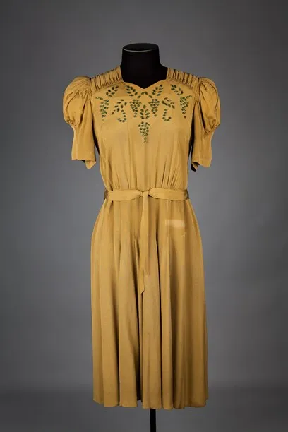 Mustard dress with short leg-of-mutton sleeve