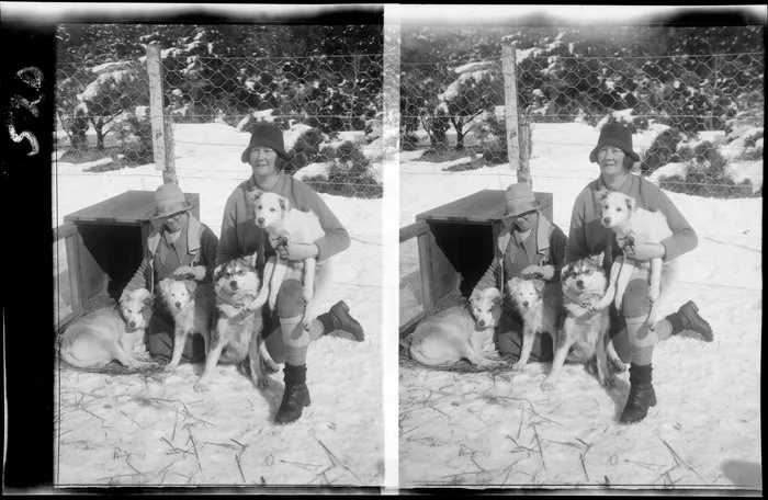 Unidentified women, with sled dogs, Mount Cook National Park, Canterbury Region