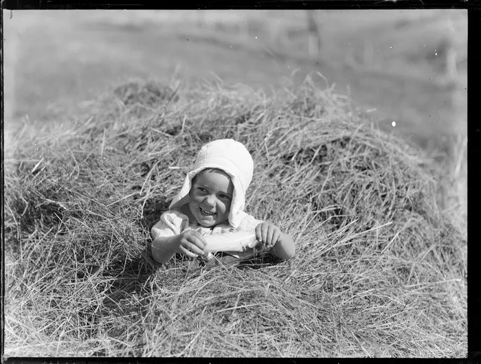 Summer Child Studies series, unidentified child in hay