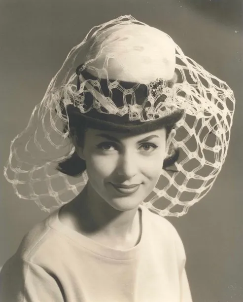 Hat with a wide mesh veil