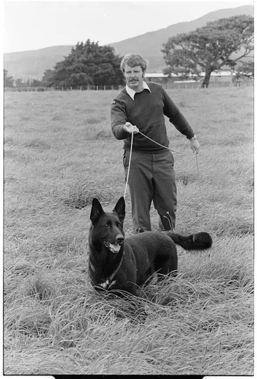 Image: Policeman and dog in tracking excersize, Trentham - Photograph taken by Don Scott