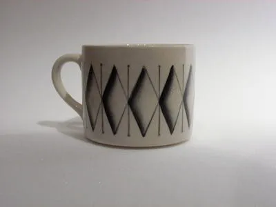 coffee cans and saucers