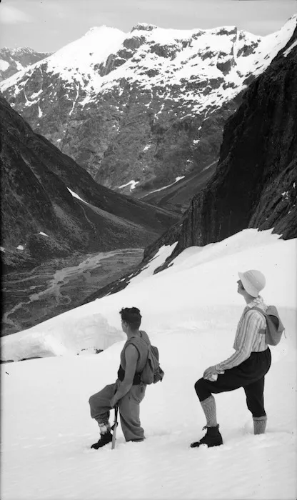 A man and woman walking in snow in the Eglinton River Valley, Southland