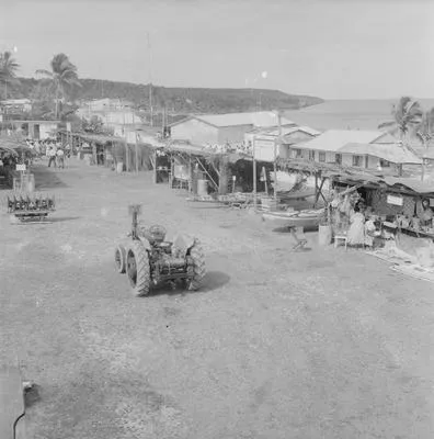[Birds eye view of stalls and tractors]