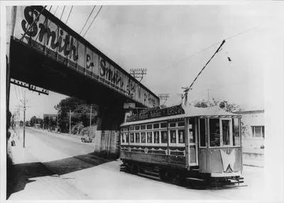 Tram II passing under the Morningside Railway overbridge