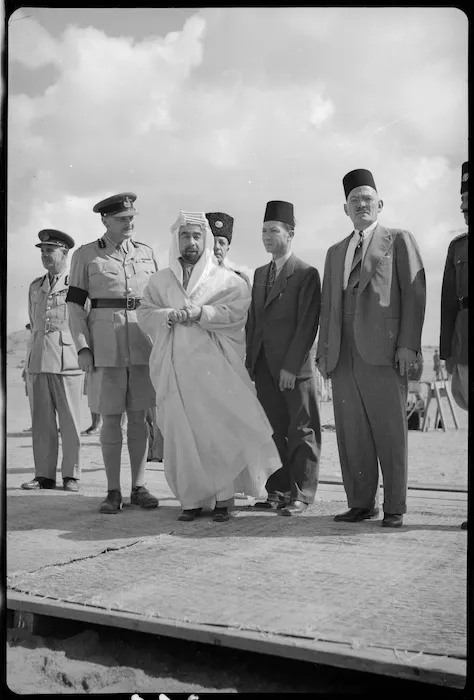 Emir of Trans-Jordania on the saluting base during his visit to Maadi