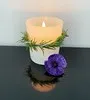 Anzac Day candle with purple poppy