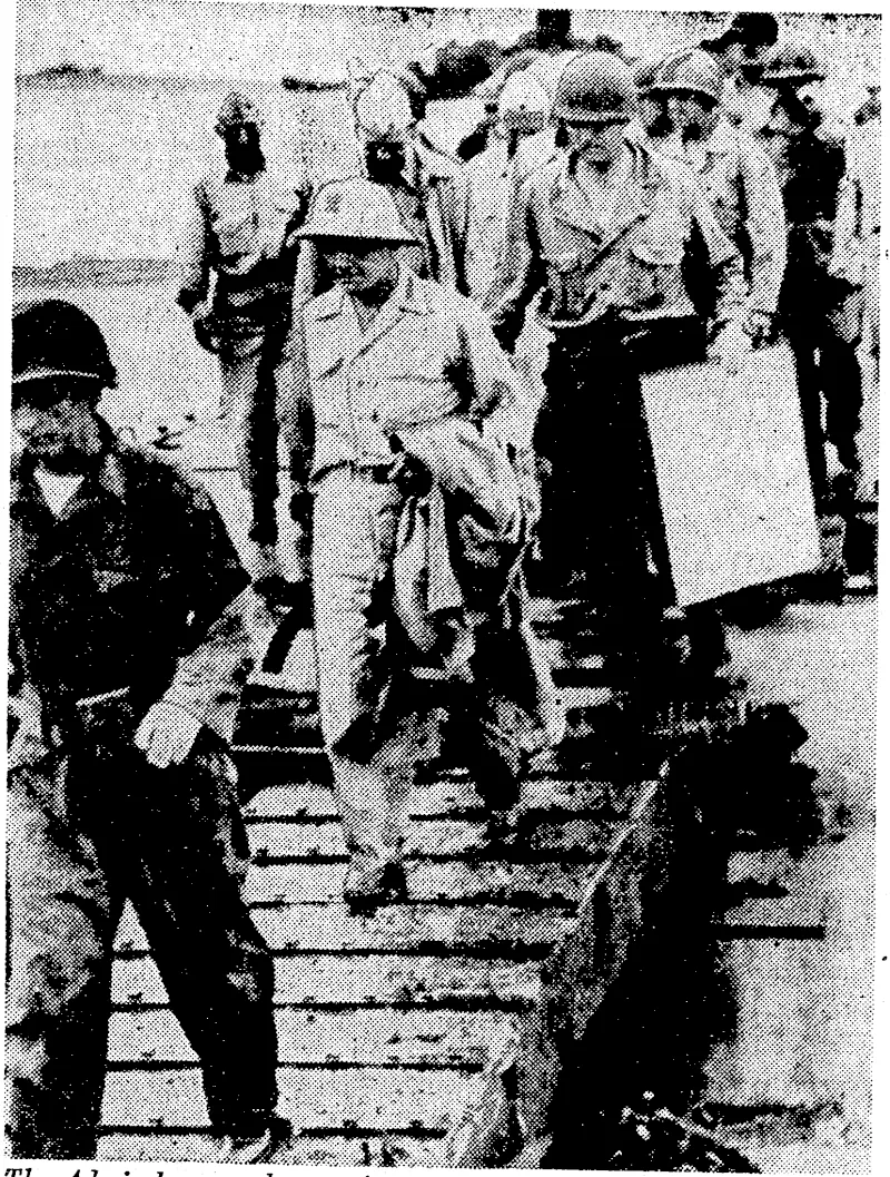 The Admiral goes ashore. Accompanied by Army, Navy, and Marine Corps officers, Admiral W. F. Halsey, commander of the United btates Ihird Fleet, starts on a tour of Angaur, southernmost island of the Palaus, recently captured from the Japanese. (Evening Post, 20 December 1944)