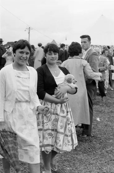 Image: Women with puppy at fair