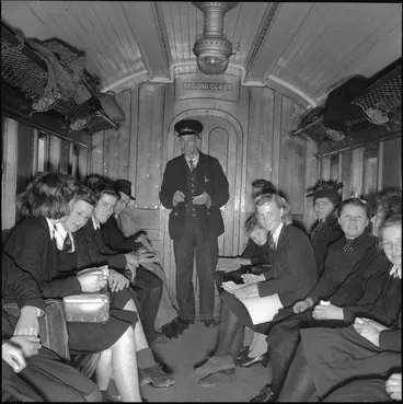 Image: School children travelling by train, and guard, Buller district