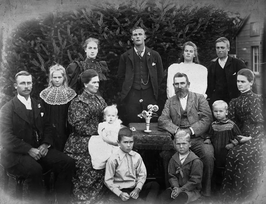 Mr and Mrs J O Batchelar and family