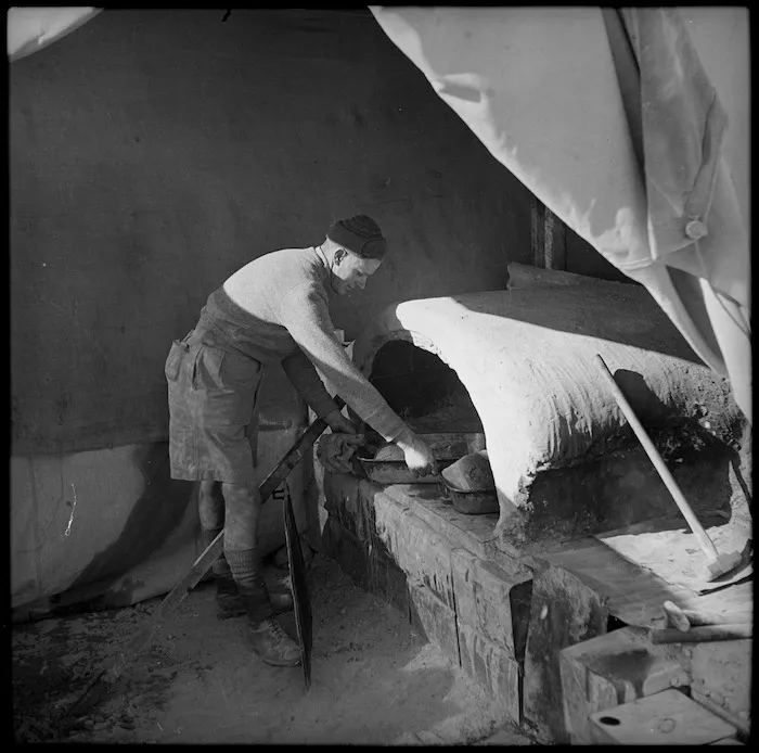 Cook with field oven in Western Desert