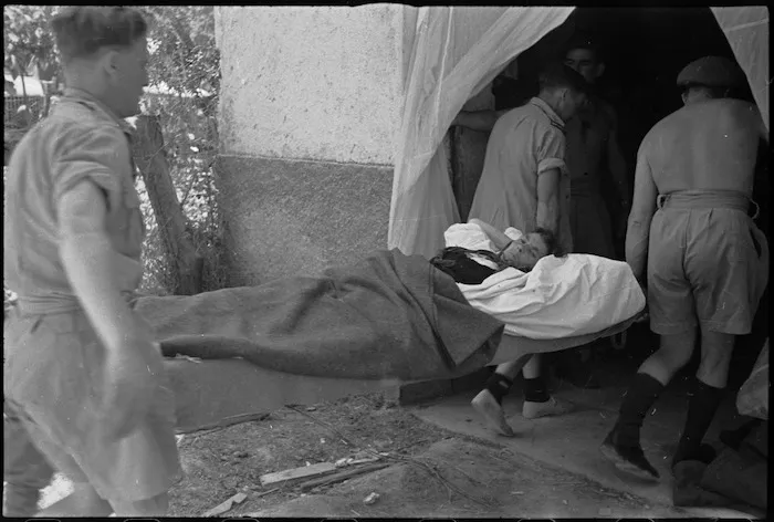 Wounded Italian woman taken into 5 NZ Field Advanced Dressing Station outside Vicalvi, World War II - Photograph taken by George Kaye