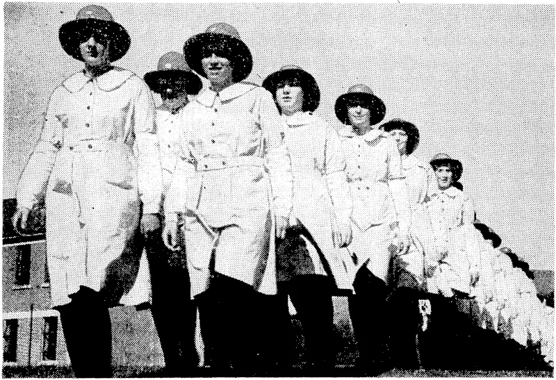 Cadets of the Hutt Valley Division of the St. fohn Ambulance marching into position in the grounds of the Hutt Valley High School, the music being provided by the Lower Hutt Municipal Band. (Evening Post, 10 October 1938)