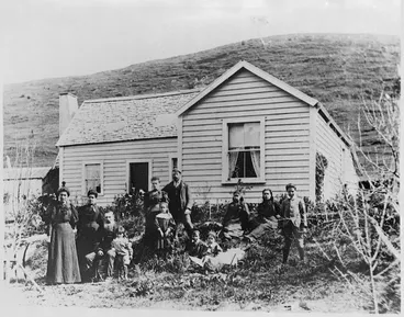 Image: Portrait of the Thoms family and Edith Clarke outside the Thoms house at Te Awaiti, Marlborough Sounds