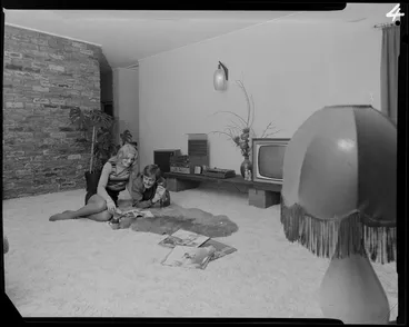 Image: Young people with dog in lounge
