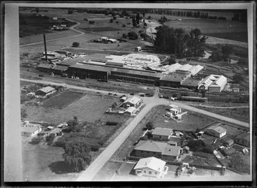 Image: Hawkes Bay Farmers Freezing Works, Whakatu, showing buildings with road and field in front, Hawkes Bay District