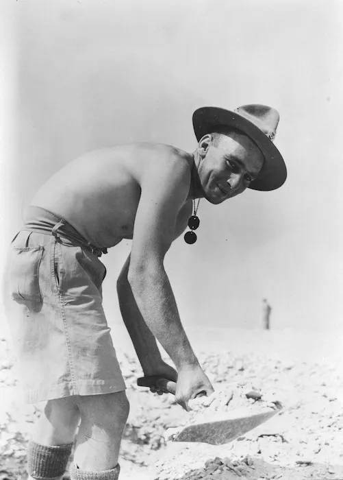 Soldier digging in after air raids, Maadi, Egypt