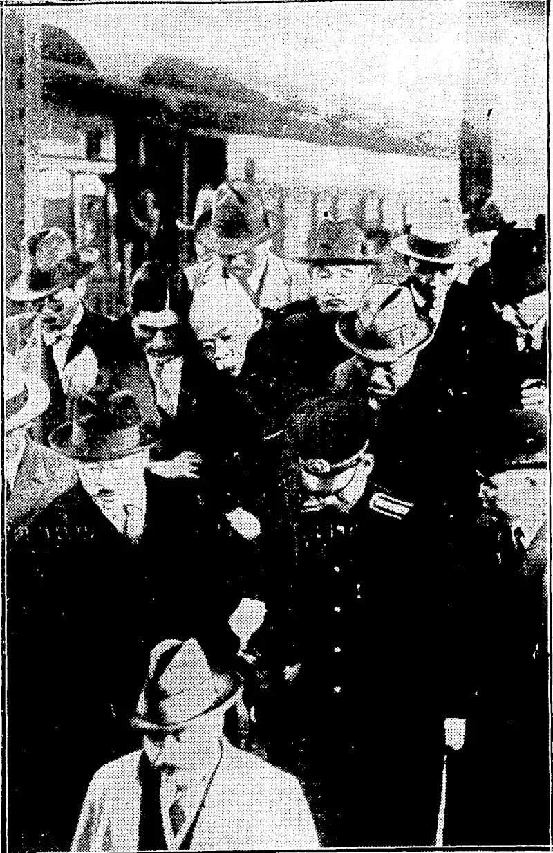 Sport and General Photo. ATTEMPTED ASSASSINATION OF JAPANESE PRIME MINISTER.—Mr. Hamaguchi being carried into the stalionmaster's office on Tolcio station after the attempted assassination on 14th November by a youth named Tomeo Sagoya. (Evening Post, 06 January 1931)