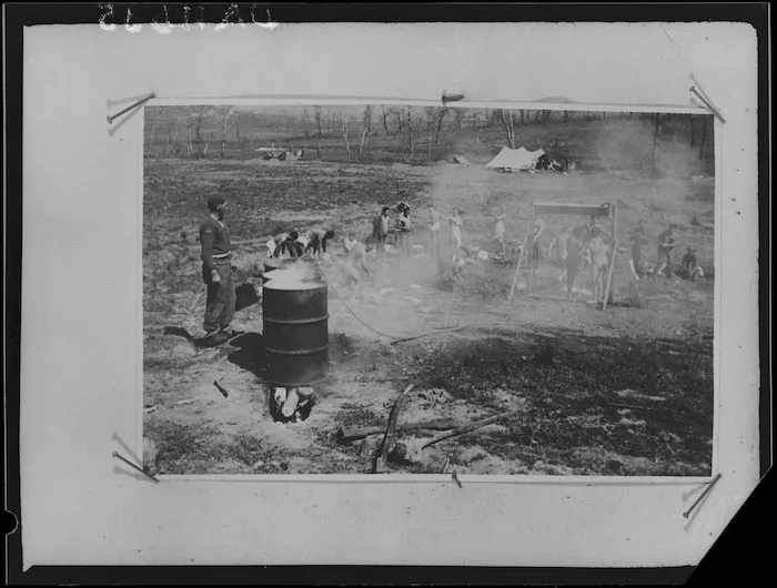 Members of 28 (Maori) Battalion showering, Cassino area, Italy - Photograph taken by Dr C N D'Arcy