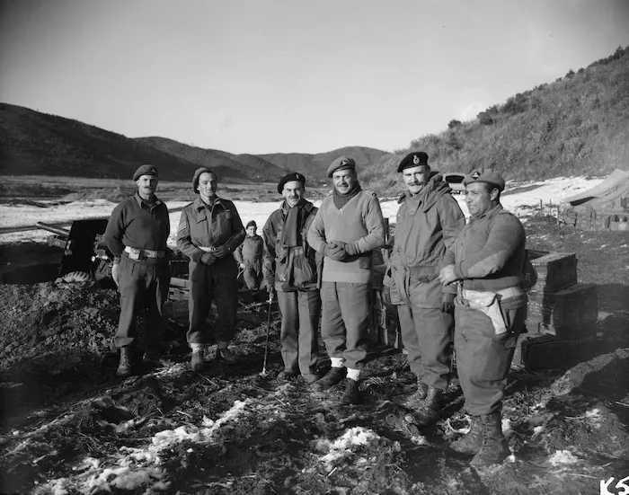 New Zealand personnel photographed during a tour of inspection by Brigader R S Park and Brigadier W G Gentry