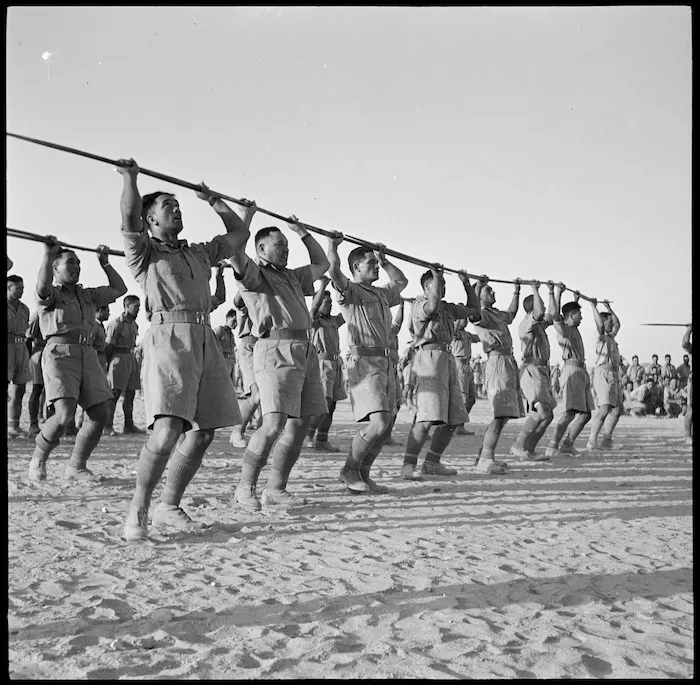 Maori Battalion performing a haka for the King of Greece, at Helwan, Egypt, during World War 2