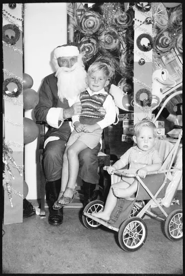 Children sitting on Santa's knee, 1959 Image: Children sitting on Santa's knee, 1959