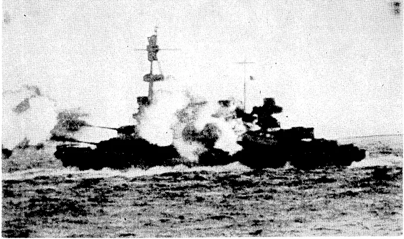 A United States cruiser blasting military installations on a Japanese island in the Pacific. (Evening Post, 09 May 1942)