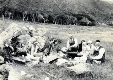 Group of people having picnic outdoors : digital image