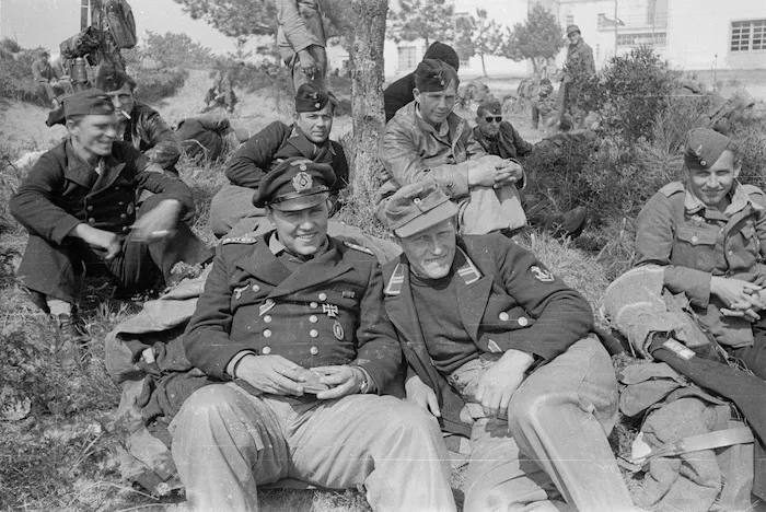 German naval personnel who surrendered to 21st New Zealand Battalion on the beach near Lignano, Italy, 5 April 1945 - Photograph taken by George Kaye