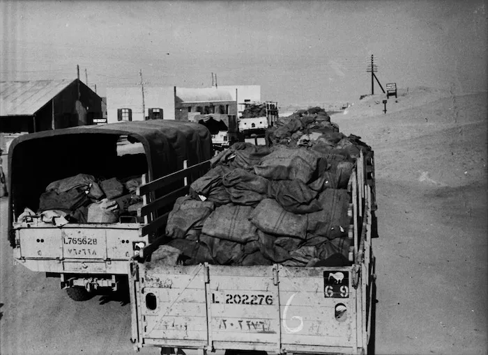 Military trucks carrying Christmas mail during World War II, NZ Maadi Camp, Egypt