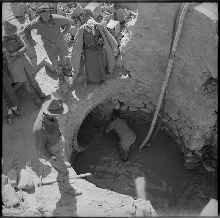 NZ Engineers adjusting pump in a calvert at Akaba - Photograph taken by M D Elias