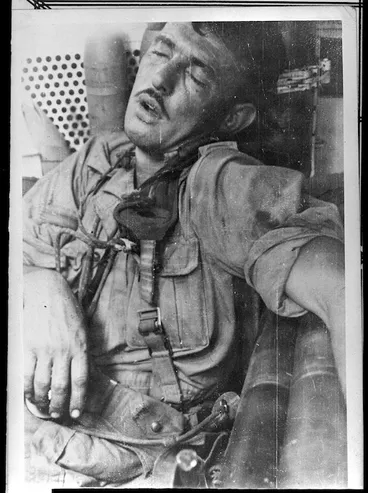 Image: New Zealand World War 2 soldier Merv L Stringer asleep after four days and nights days in action, Italy